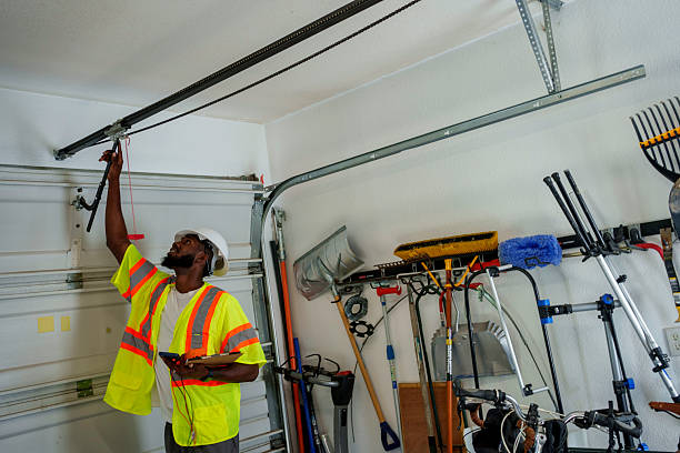 Professional Garage Door technician working in Elmsford, NY